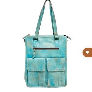 Turquoise leather concealed carry handbag